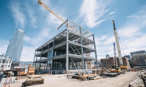 medium-vecteezy_a-construction-site-with-a-crane-and-building-under_68605255_medium